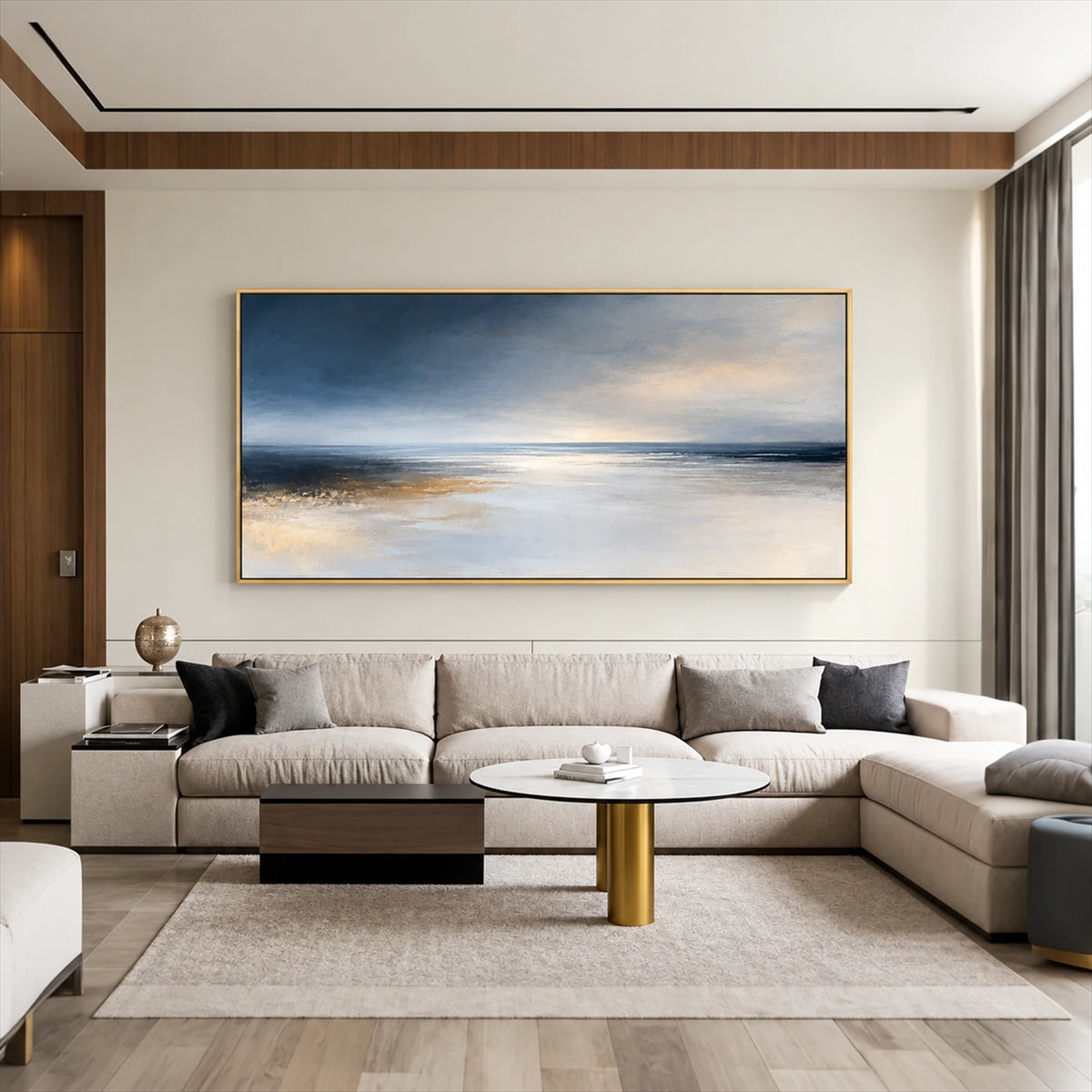 Silver Stillwater painting above a cream sectional beneath a wooden ceiling detail.