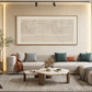 Ivory Cadence painting above a cream sectional and round wooden tables.