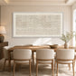 Ivory Cadence painting above a wooden dining table with cream chairs.
