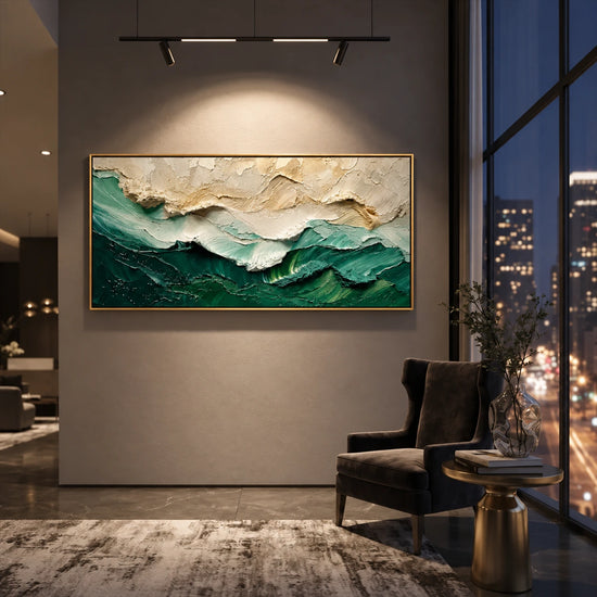 Emerald Crest painting beside a dark armchair and nighttime windows.