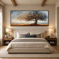 Autumn Radiance painting above an upholstered bed beneath exposed beams.