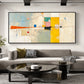 Citrine Balance painting above a gray sofa and sculptural black coffee table.