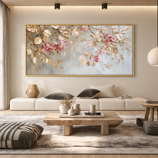 Blush Canopy painting above a cream sofa with dark cushions and a low timber table.