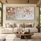 Blush Canopy painting above a wide ivory sectional in a sunlit room.