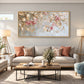 Blush Canopy painting above a pale sofa with blush cushions between floor lamps.