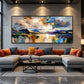 Alpine Reflection painting above a gray sectional with rust cushions.