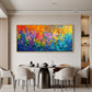 Chromatic Blossoms painting above a round dining table and cream chairs.