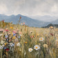 White daisies and scattered pink, yellow and violet wildflowers rise from a sunlit meadow beneath distant blue mountains. Full 2:1 artwork without a frame.