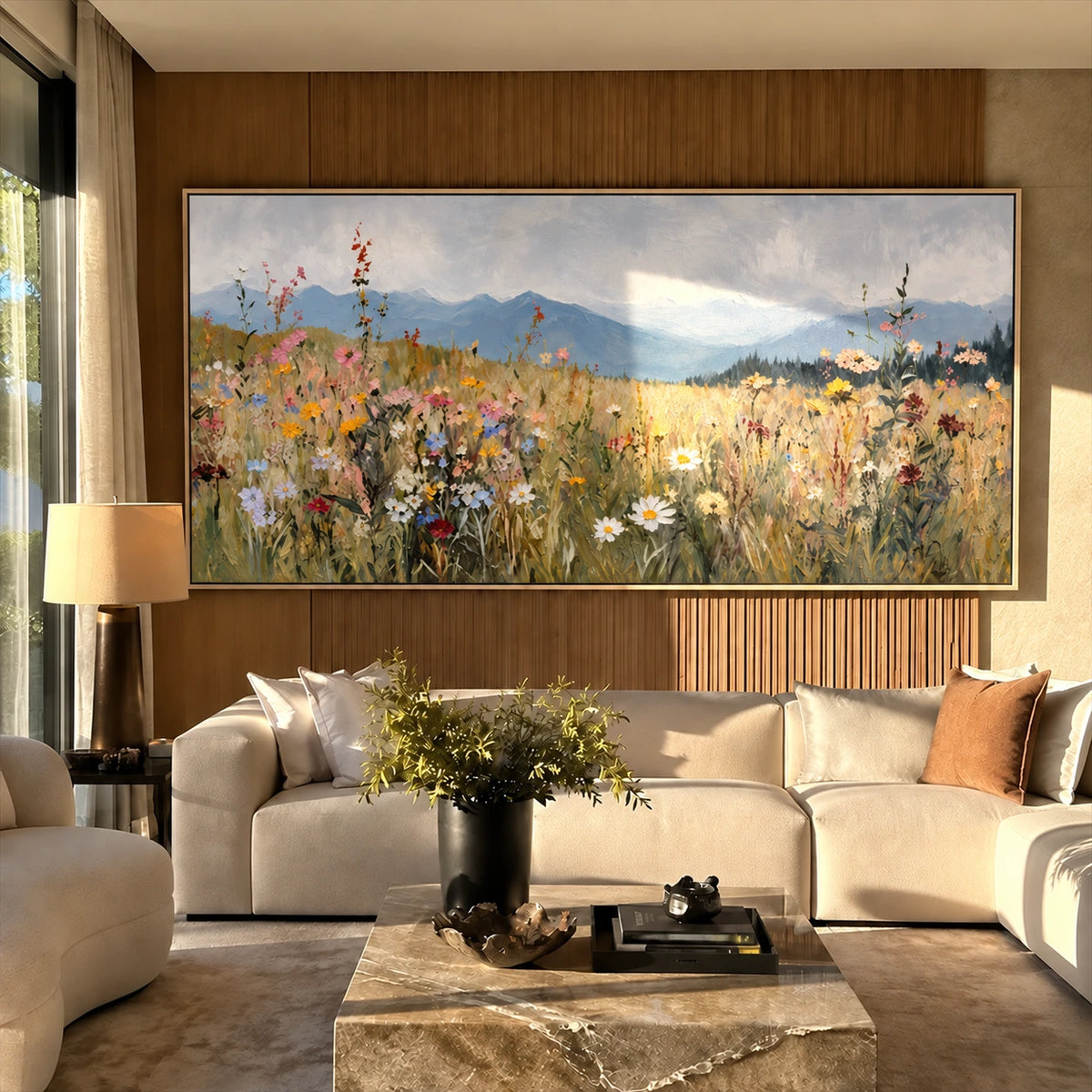 Meadow Distance painting above a cream sofa beside warm wood paneling.