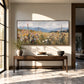 Meadow Distance painting above a wooden console in a sunlit hallway.