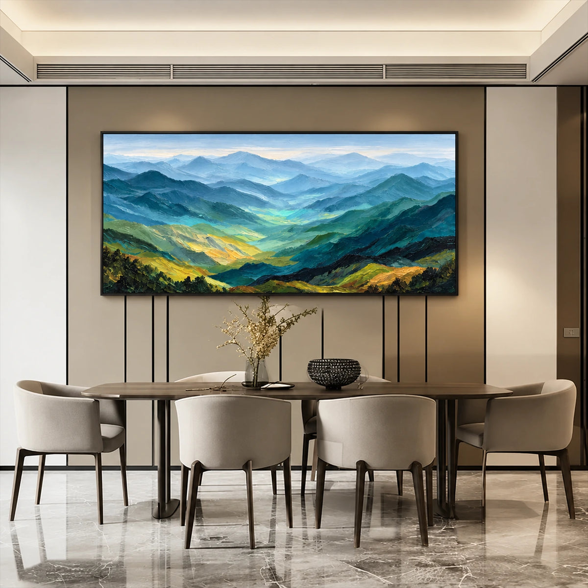Sunlit Ridges painting above a dining table and pale chairs.