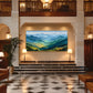 Sunlit Ridges painting in a tall entrance hall.
