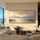Quiet Tide painting above pale living room seating.