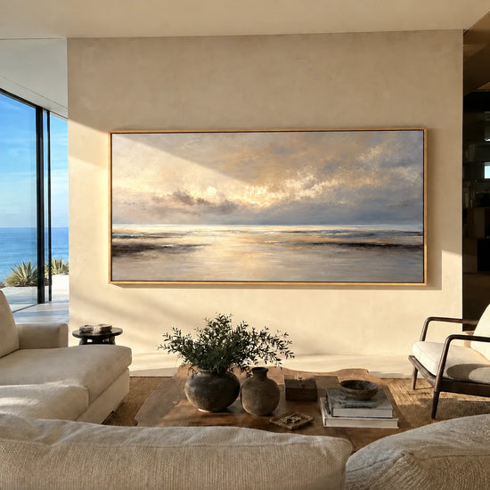Quiet Tide painting above pale living room seating.