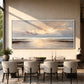 Quiet Tide painting above a dining table.