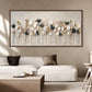 Quiet Foliage botanical painting above a pale sectional and wooden coffee table.