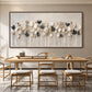 Quiet Foliage botanical painting above a wooden dining table and chairs.