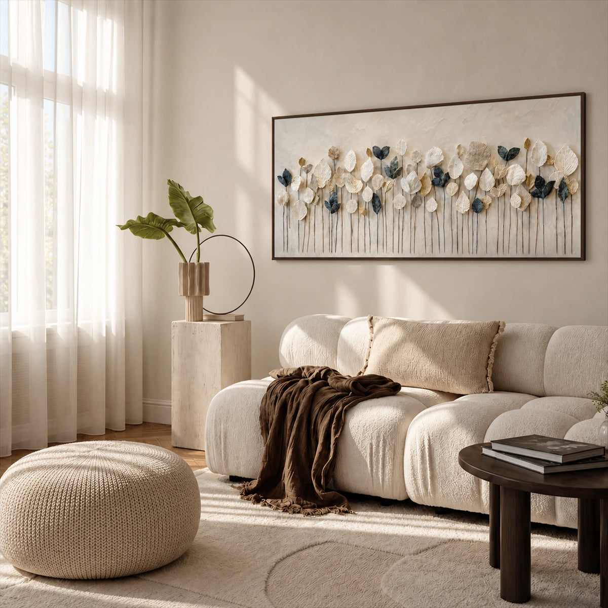 Quiet Foliage botanical painting above a cream sofa beside tall curtains.