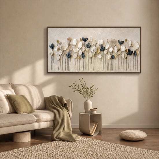 Quiet Foliage botanical painting above a sofa with olive cushions and a small side table.