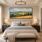 Golden Hills painting above a neutral bed.