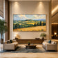 Golden Hills painting above living room seating.