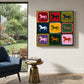 Chromatic Horses painting above lounge seating beside garden windows.