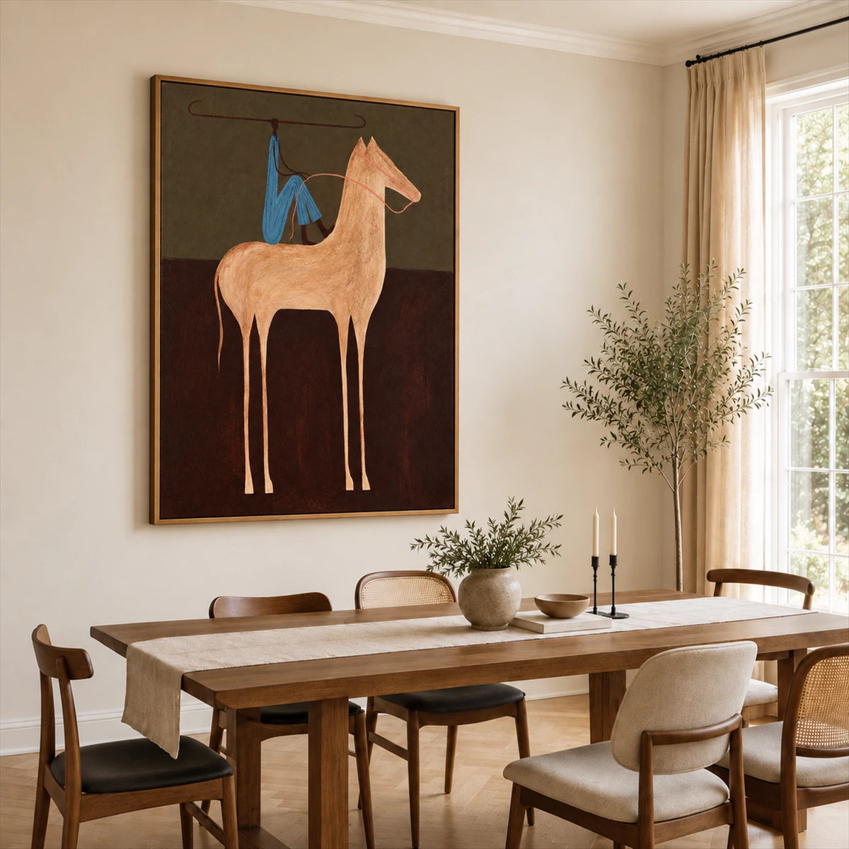 Copper Horseman painting above a dining table and sculptural chairs.