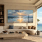 Sunset Shore painting above a cream sofa beside tall windows.