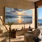 Sunset Shore painting above a wooden console beside an armchair.