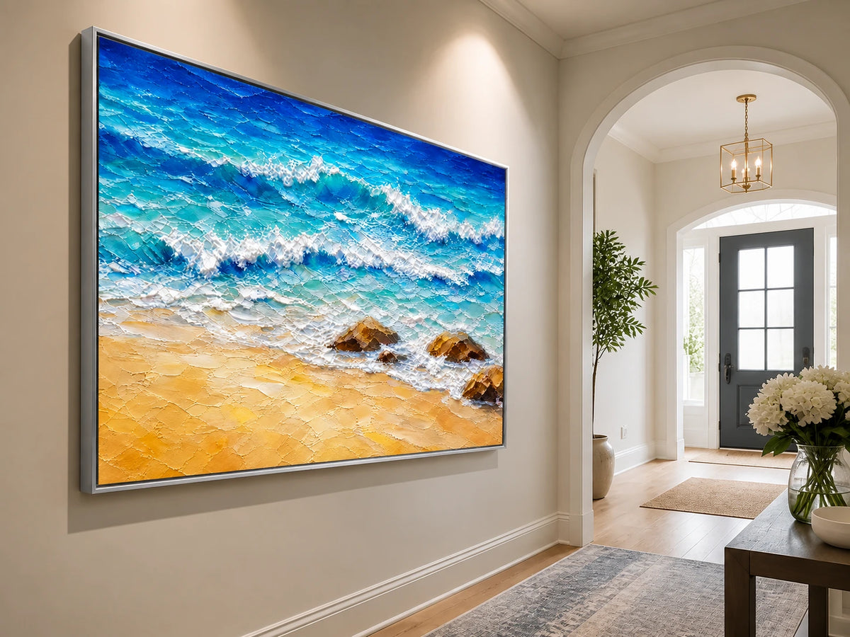 Turquoise Breakers in a silver frame on a pale entryway wall beside an arched doorway.