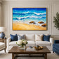 Turquoise Breakers in a gold frame above a pale sofa with blue armchairs in a bright living room.