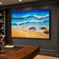Turquoise Breakers in a slim black frame above a wooden desk in a dark paneled office.