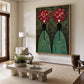 Rose Duet artwork displayed above a stone coffee table in a sunlit sitting room.
