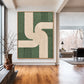 Sage Rhythm artwork displayed on a pale wall beside a wooden floor and open living area.