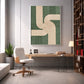 Sage Rhythm artwork displayed above a desk and pale office chair beside tall shelving.