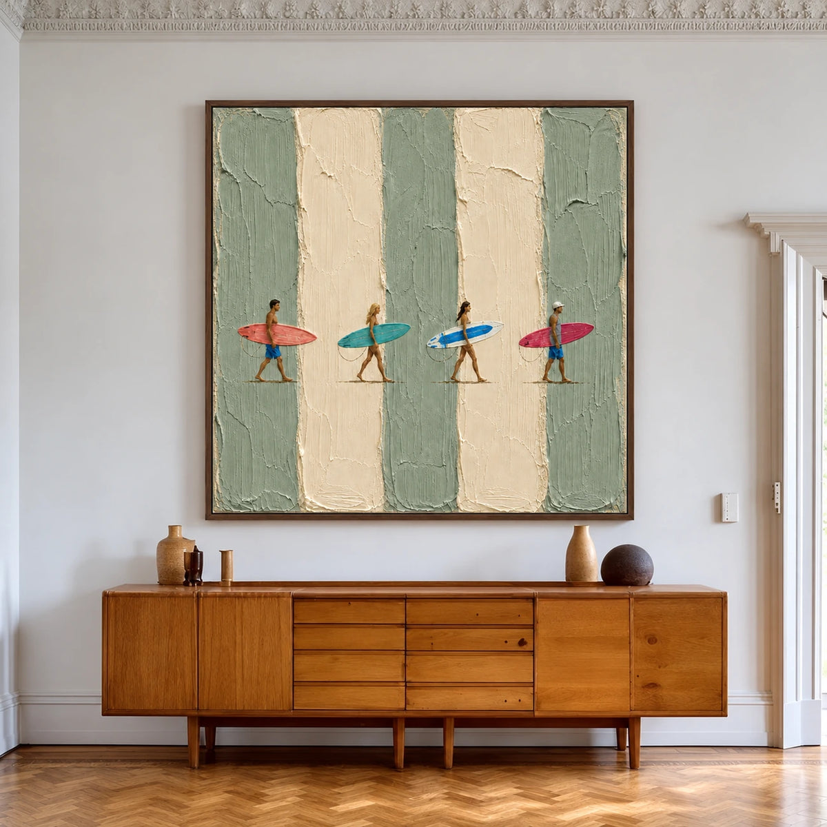 Surf Quartet artwork displayed above a wooden sideboard in a bright paneled interior.