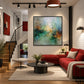 Mistbound Light artwork displayed above red seating in a bright loft living room.