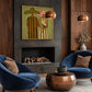 Olive Vows artwork displayed above a fireplace beside blue armchairs.