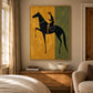 Ochre Rider artwork displayed above a wooden desk beside a curtained window and a bed.