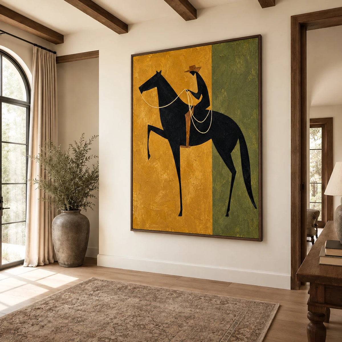 Ochre Rider artwork displayed on a pale wall in a sunlit entryway with tall windows.