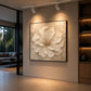 Petal Relief artwork displayed on a wall beside dark shelving and tall windows.