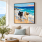 Surf Pals artwork displayed above a pale sofa beside a window overlooking the sea.