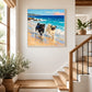 Surf Pals artwork displayed beside a staircase and sunlit windows.