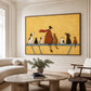 Golden Companions artwork displayed above a cream sofa beside tall white windows.