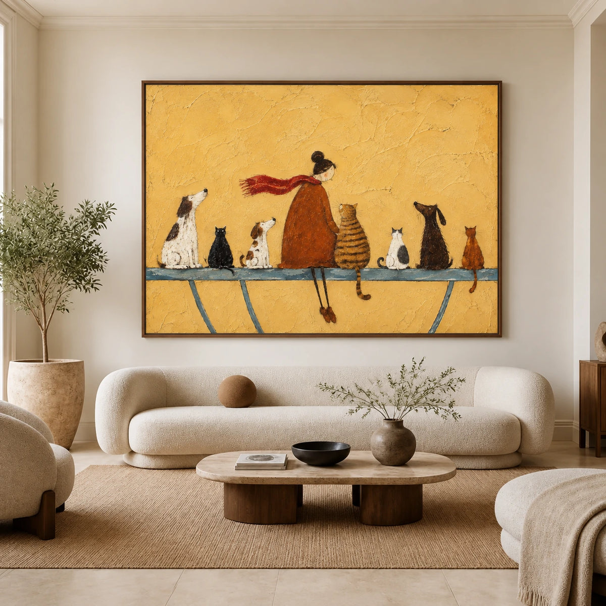 Golden Companions artwork displayed above a cream sofa in an arched sitting room.