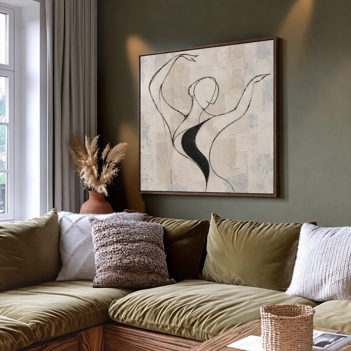 Poised Lines artwork displayed above a sofa with olive green cushions.