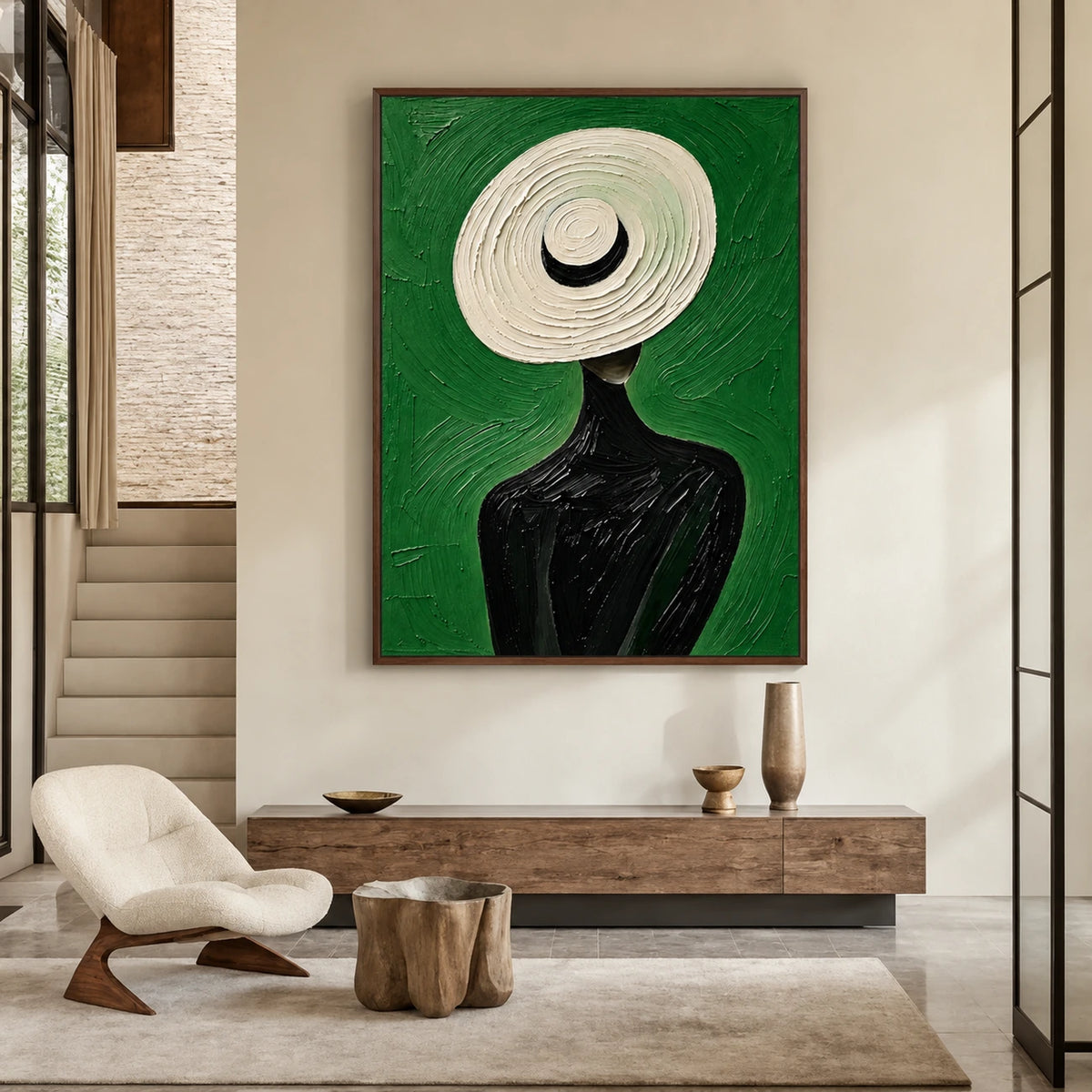 Ivory Brim artwork displayed above a wooden console beside a pale lounge chair and stairs.
