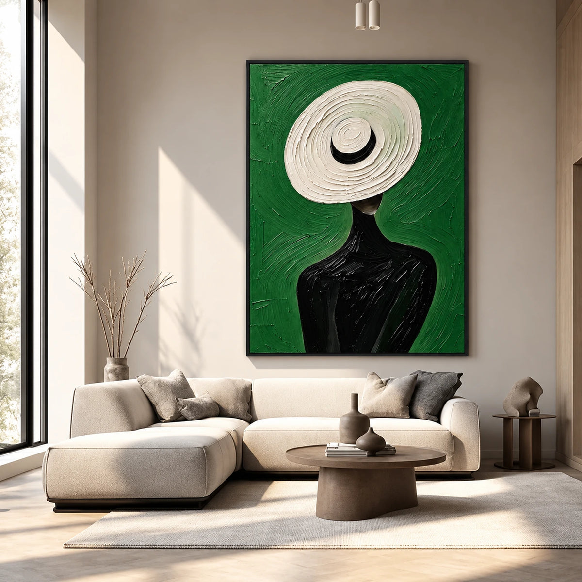 Ivory Brim artwork displayed above a light sectional sofa in a sunlit sitting room.