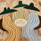 Striped Gathering full artwork with three figures in green hats and flowing ochre, sage and blue stripes gathered around a small table.