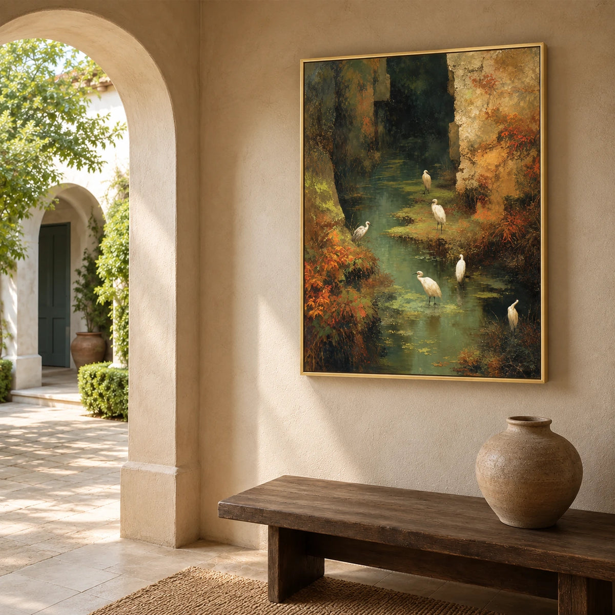 Stillwater Haven artwork displayed above a wooden bench beside an arched courtyard entrance.
